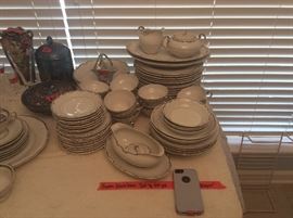 60 piece set of Ucagco Japan Heirloom dishes. Includes accessory pieces - gravy boat, cream & sugar set, berry bowls, platters, vegetable bowls, cup & matching saucers, bread & butter small plates.