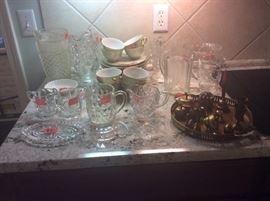 Brass bells & animals on brass tray - sell individually on all. Beautiful 20 piece hand painted Lefton snack plates & cups along with other vintage glass items.