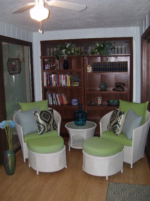Faux wicker set and real wood book cases.