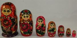 Matryoshka Russian Nesting Dolls: A set of 7 hand painted dolls in decreasing size place one inside the other.