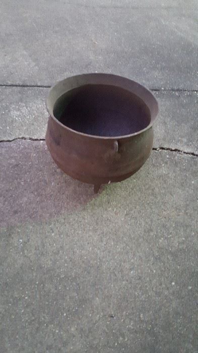 Old black iron pot