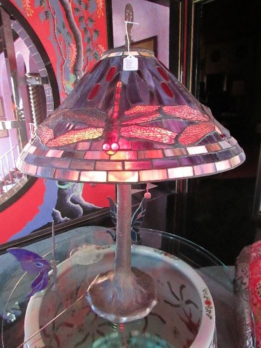 Tiffany-style leaded glass dragonfly lamp with signed base.