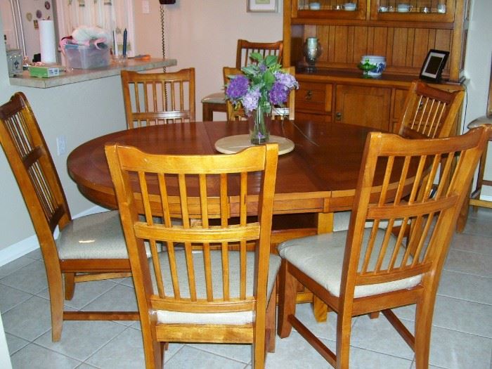 Like-new Lane Furniture dining room set with lift-up leaf - the plastic has never been removed from the chairs.