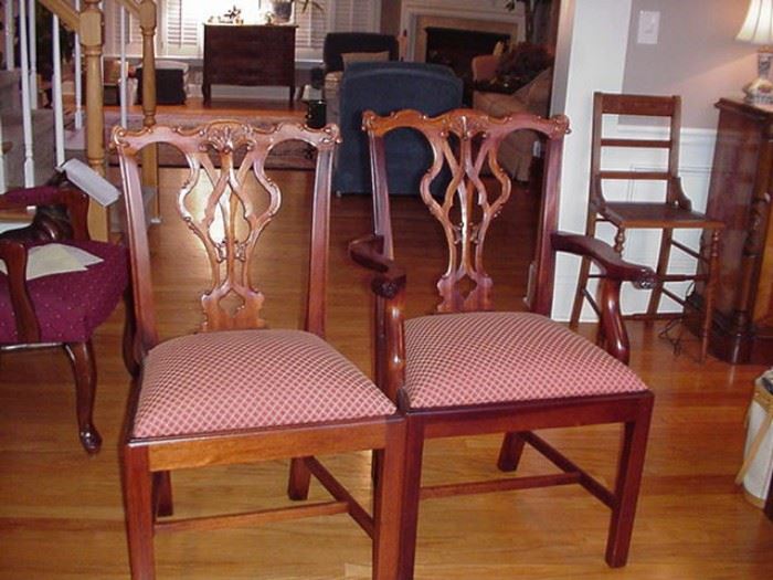 Two of six Chippendale style dining chairs