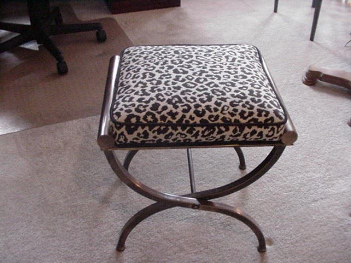 Brushed brass stool with leopard fabric upholstery