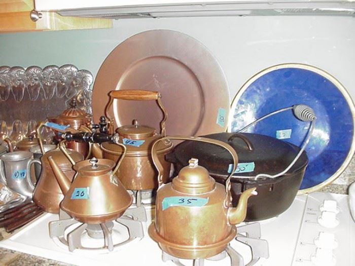 Lots of copper and iron cookware