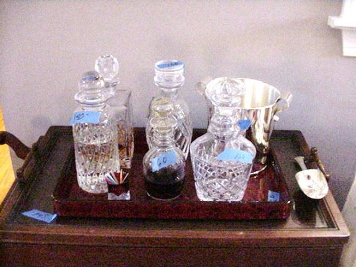 Many fine crystal decanters, ice bucket