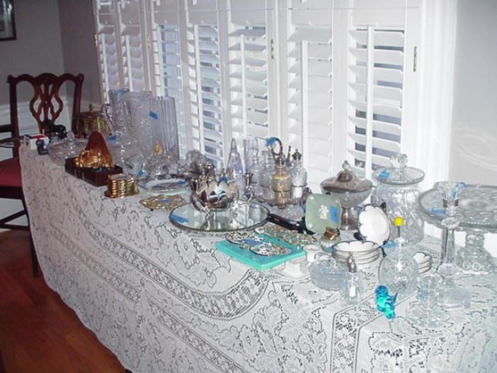 Lots of crystal, cut glass, brass, silverplated serving pieces, early American pressed glass, and more