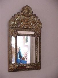 Unusual hammered brass mirror