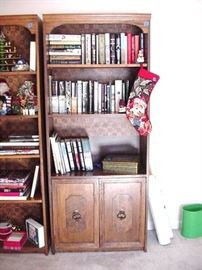 Shelf with double doors below; books, Christmas