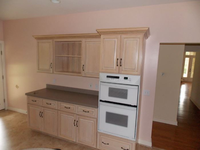Oak Kitchen cabinets white gas stove refrigerator double oven island 