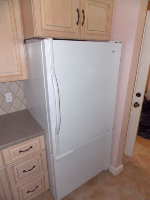 Oak Kitchen cabinets white gas stove refrigerator double oven island 