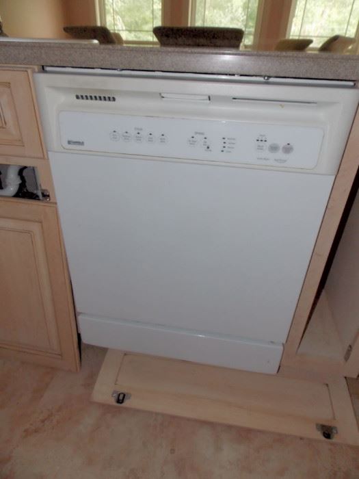 Oak Kitchen cabinets white gas stove refrigerator double oven island dishwasher