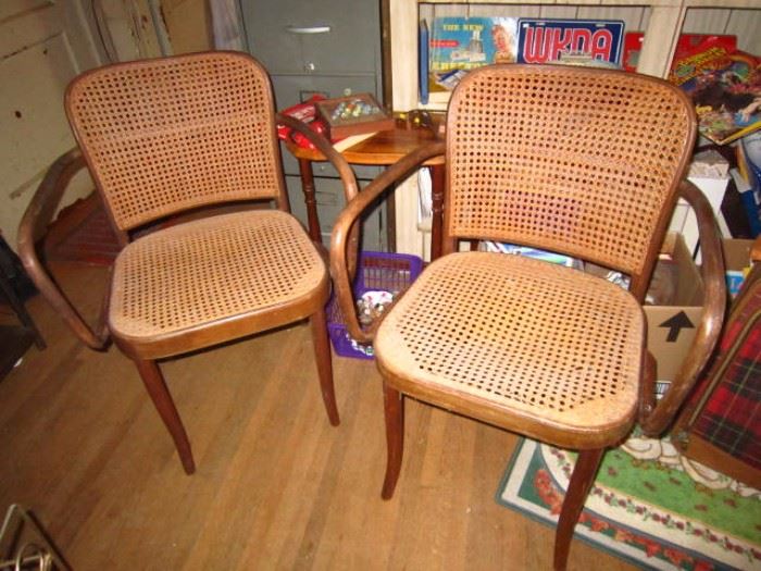 Stendig chairs-one has minor caning issue