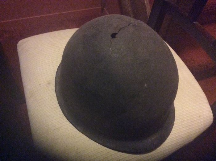WW 2 Helmet with bullet hole. 
