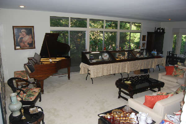 living room with baby grand, antique Chinese screen, antique Chinese ceramics & pottery