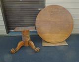 54" OAK PEDESTAL TABLE WITH FOUR CLAW FEET