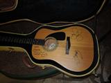 40. DG-6 Fender guitar & case signed by Crosby, Stills & Nash –       Asking:  $595