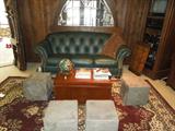 20.  Thomasville tufted camel back green leather sofa – 8’ long          Asking:  $800
