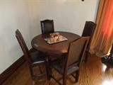 18.  4’ diameter Round table with four chairs –  Asking $450