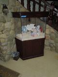 60.  Custom made round back salt water aquarium – Asking:  $450
