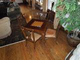 8.  Alexander Julian game table & four Chippendale style chairs with leather seats –      Asking: $995