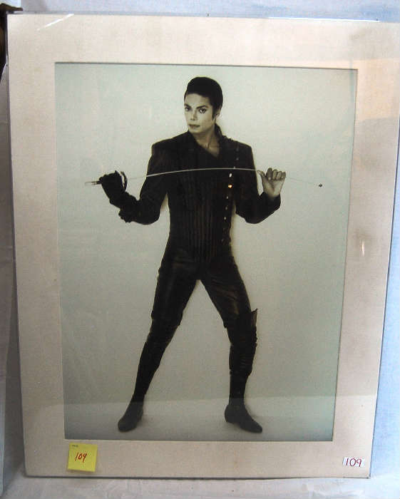 PORTRAIT OF MICHAEL JACKSON IN FENCING ATTIRE- HOLDING SWORD IN BOTH HANDS - AFTER HERB RITTS