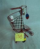 Brad Howe painted and pierced metal