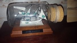 Ship in a bottle made with a business card