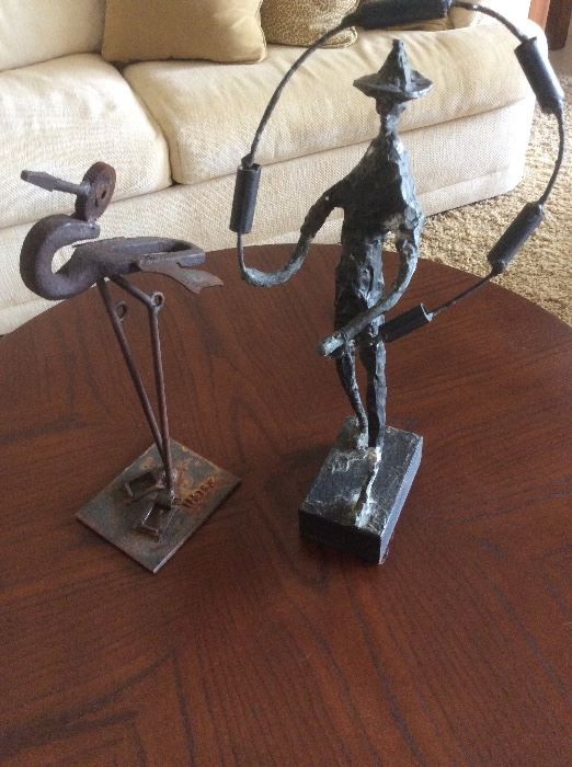 Sculptures   On the right is a bronze by known artist Herbert Kallem. It is called "Mid Century Modern Brutalist Male". The other sculpture of the bird has a signature you will see in one of the next photos. 
