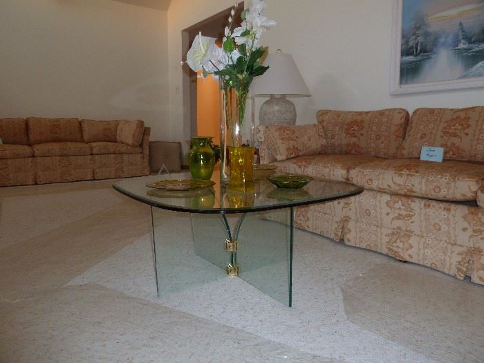 Down-filled sofas (2) and glass cocktail table with glass top