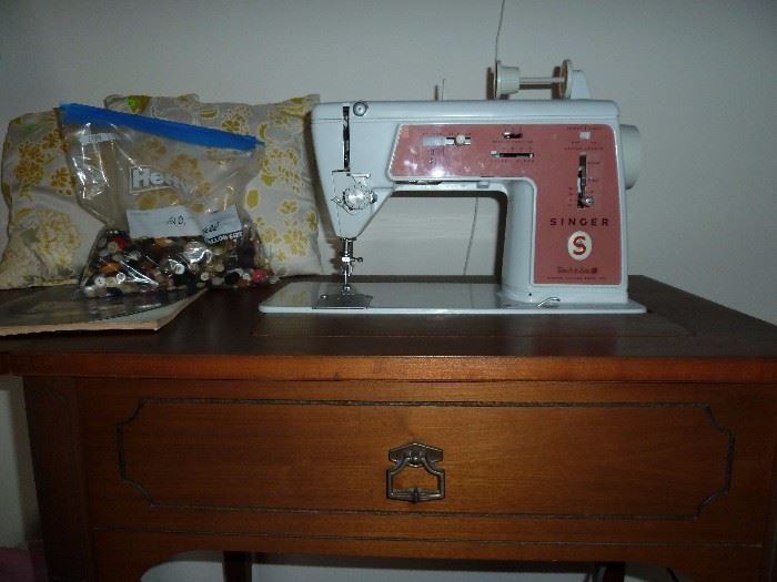 Singer sewing machine in custom cabinet - Buttons, spools of thread, fabric, assorted sewing supplies