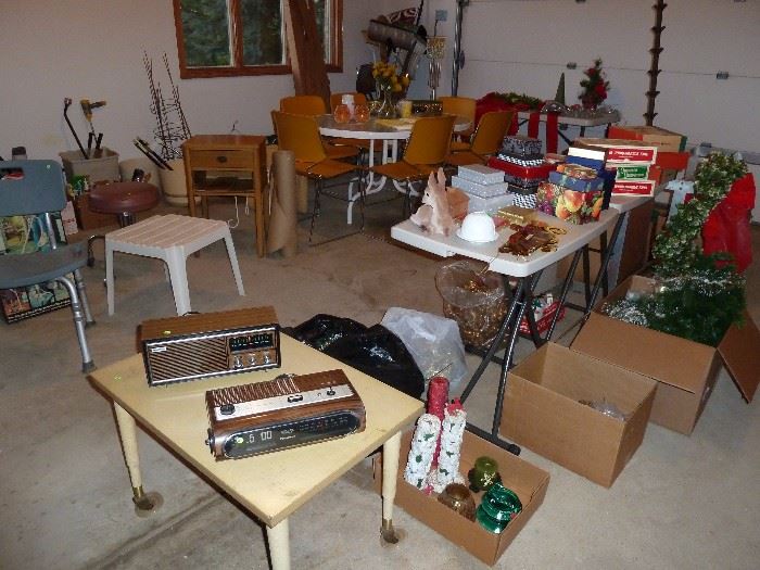 Vintage radios, Christmas decor, bath bench, rolling stool, ladders, electrical supplies, steam mops, floor polisher, vintage chest of drawers, steel shelving units and more