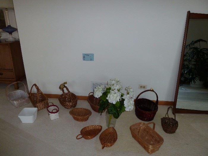 Baskets and wood framed floor/wall mirror