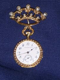 Tiffany watch with 14k gold & pearl associate pin. Pin not marked.