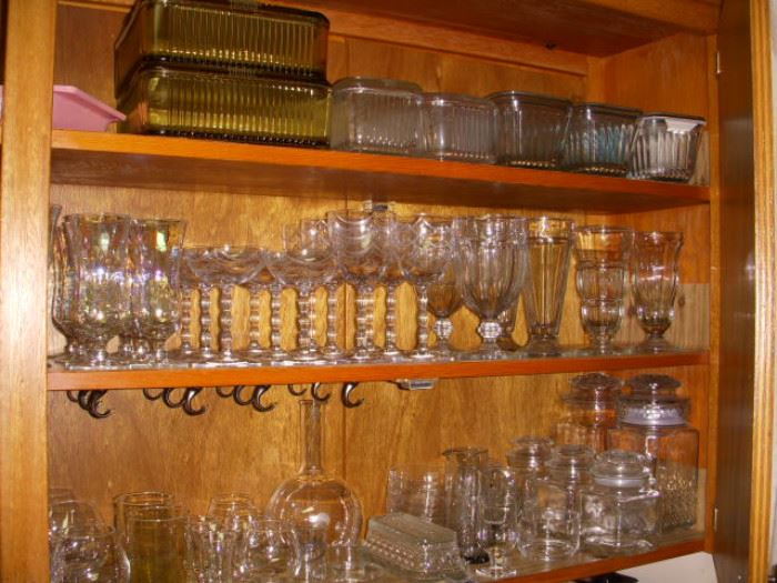Kitchen glass storage dishes (some old, some new), and stemware