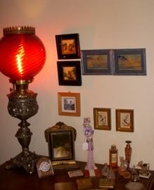 Victorian banquet lamp with cranberry glass shade, along with vintage dresser clocks, perfumes, etc.
