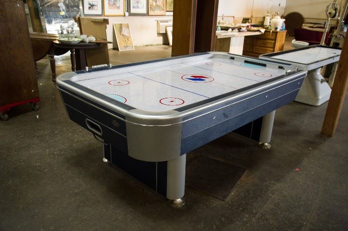 Just imagine if all disputes could be settled over fierce battle of air hockey!!  This awesome table was made by the Sportscraft company.