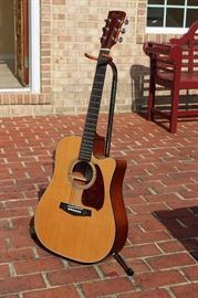 Ibanez Acoustic Guitar

Fishman Equipped Acoustic Guitar, sticker inside reads Ibanez model no. PF5CENT-1001.
Serial no. G00070967. Overall very good condition, comes with On-Stage adjustable height guitar stand as shown in pictures. Model no. 41235