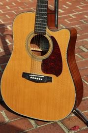 Ibanez Acoustic Guitar

Fishman Equipped Acoustic Guitar, sticker inside reads Ibanez model no. PF5CENT-1001.
Serial no. G00070967. Overall very good condition, comes with On-Stage adjustable height guitar stand as shown in pictures. Model no. 41235
