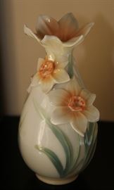 Buddha Stand

Pretty Asian-themed wall hanging, 3-shelved unit with Buddha figurine and vase as shown in pictures. Measures 46"tall x 9 1/2"wide x 7 1/2"deep. Buddha figurine is 9 1/2"tall. Overall very good condition. Black painted with copper-toned trim. No identifying markings on the Buddha figure. 