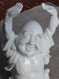 Buddha Stand

Pretty Asian-themed wall hanging, 3-shelved unit with Buddha figurine and vase as shown in pictures. Measures 46"tall x 9 1/2"wide x 7 1/2"deep. Buddha figurine is 9 1/2"tall. Overall very good condition. Black painted with copper-toned trim. No identifying markings on the Buddha figure. 