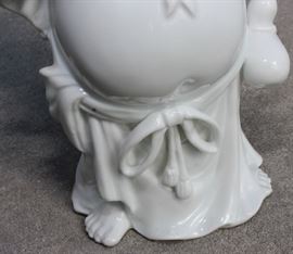 Buddha Stand

Pretty Asian-themed wall hanging, 3-shelved unit with Buddha figurine and vase as shown in pictures. Measures 46"tall x 9 1/2"wide x 7 1/2"deep. Buddha figurine is 9 1/2"tall. Overall very good condition. Black painted with copper-toned trim. No identifying markings on the Buddha figure. 