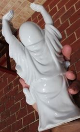 Buddha Stand

Pretty Asian-themed wall hanging, 3-shelved unit with Buddha figurine and vase as shown in pictures. Measures 46"tall x 9 1/2"wide x 7 1/2"deep. Buddha figurine is 9 1/2"tall. Overall very good condition. Black painted with copper-toned trim. No identifying markings on the Buddha figure. 