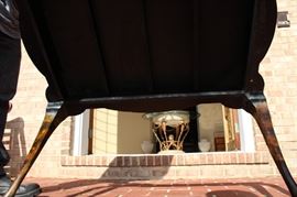 Beautiful Handpainted Side Table

Japanned. Measures 24"tall x 38"wide x 29"deep. Handpainted by: Maitland-Smith LTD. Small sticker on bottom reads: Handmade in Phillipines. Another sticker has written on it: 2543-220. Very beautiful, has pad feet and floral design top with birds. 