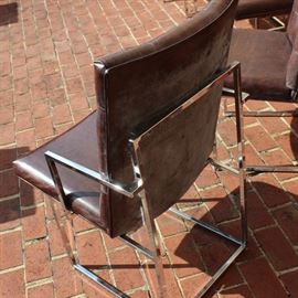 Steel Framed Dining Chair Set

8 chairs total, six without arms and two with arms (captain's chairs). Made by the Jessup Furniture Corporation. Overall very good condition, seem little used and no apparent wear or tear of the material.

All chairs measures 36"tall x 20"wide x 24 1/2"deep.