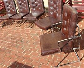 Steel Framed Dining Chair Set

8 chairs total, six without arms and two with arms (captain's chairs). Made by the Jessup Furniture Corporation. Overall very good condition, seem little used and no apparent wear or tear of the material.

All chairs measures 36"tall x 20"wide x 24 1/2"deep.