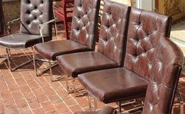 Steel Framed Dining Chair Set

8 chairs total, six without arms and two with arms (captain's chairs). Made by the Jessup Furniture Corporation. Overall very good condition, seem little used and no apparent wear or tear of the material.

All chairs measures 36"tall x 20"wide x 24 1/2"deep.