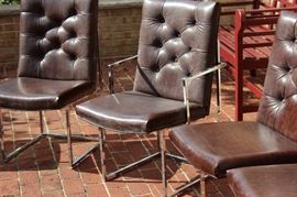 Steel Framed Dining Chair Set

8 chairs total, six without arms and two with arms (captain's chairs). Made by the Jessup Furniture Corporation. Overall very good condition, seem little used and no apparent wear or tear of the material.

All chairs measures 36"tall x 20"wide x 24 1/2"deep.