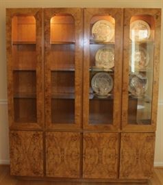 China Cabinet

Measures 6'4"tall x 5'4"wide x 17"deep.

Buffet-bottom measures 24"tall, top half is 52"tall.

Manufactured by Lane Corporation. Solid, olive oak burl veneer. Double backlit. 